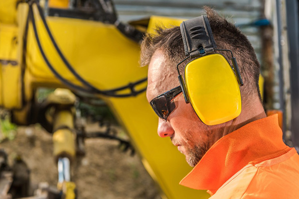 worker with hearing protection